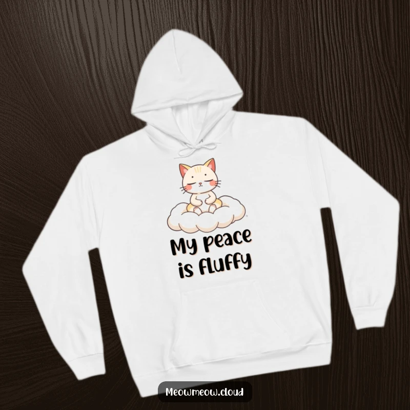 Funny cat meditation hoodie featuring a calm cat deeply meditating while comfortably seated on a fluffy cloud cushion.