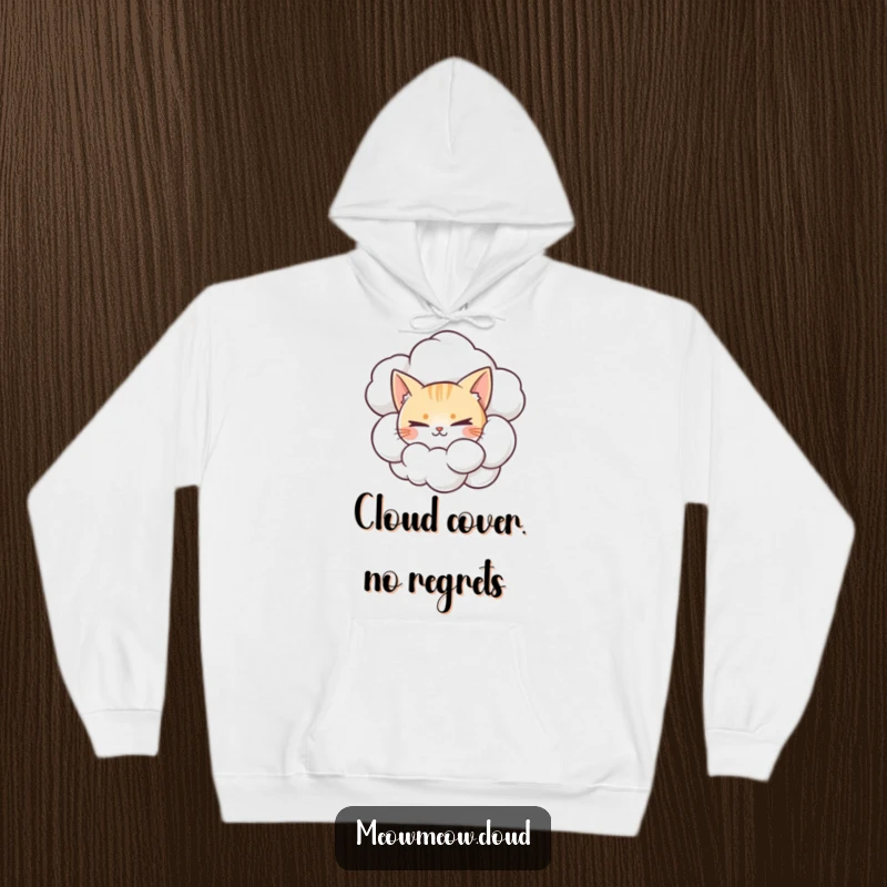 Funny hoodie of a mischievous cat emerging from a cumulonimbus cloud, offering a playful and cozy vibe.