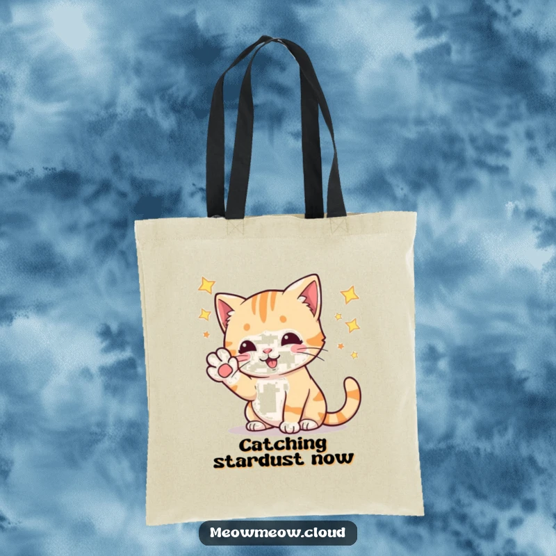 Funny playful cat batting at stars with its paw, a humorous and practical tote bag for everyday adventures.